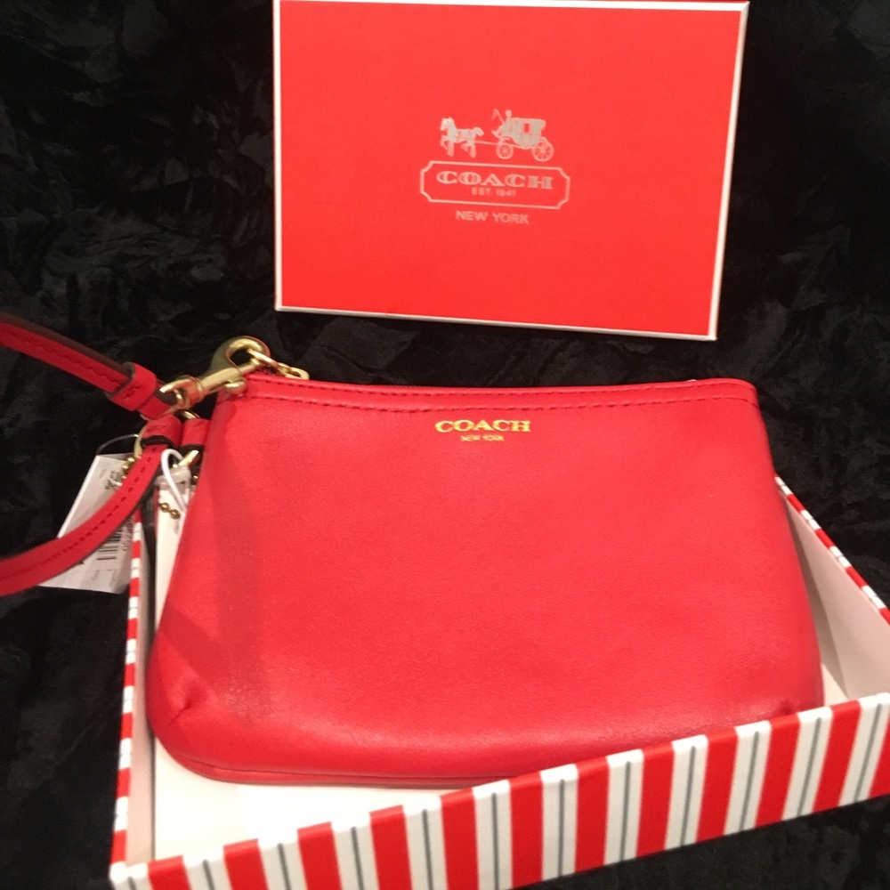 New w/tags and box red leather wristlet